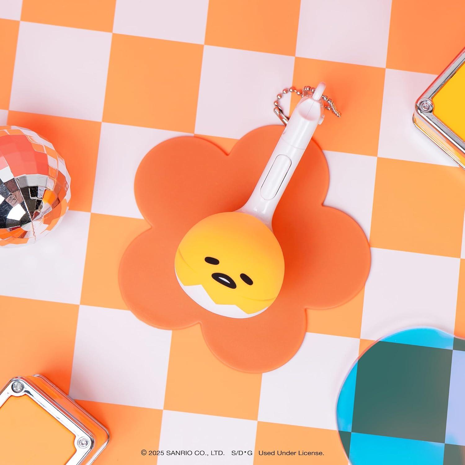 image:imageOtamatone Melody Gudetama Electronic Portable Music Instrument Synthesizer Toy from Japan by Maywa Denki Officially Licensed Gudetama The Lazy Egg English InstructionsGudetama