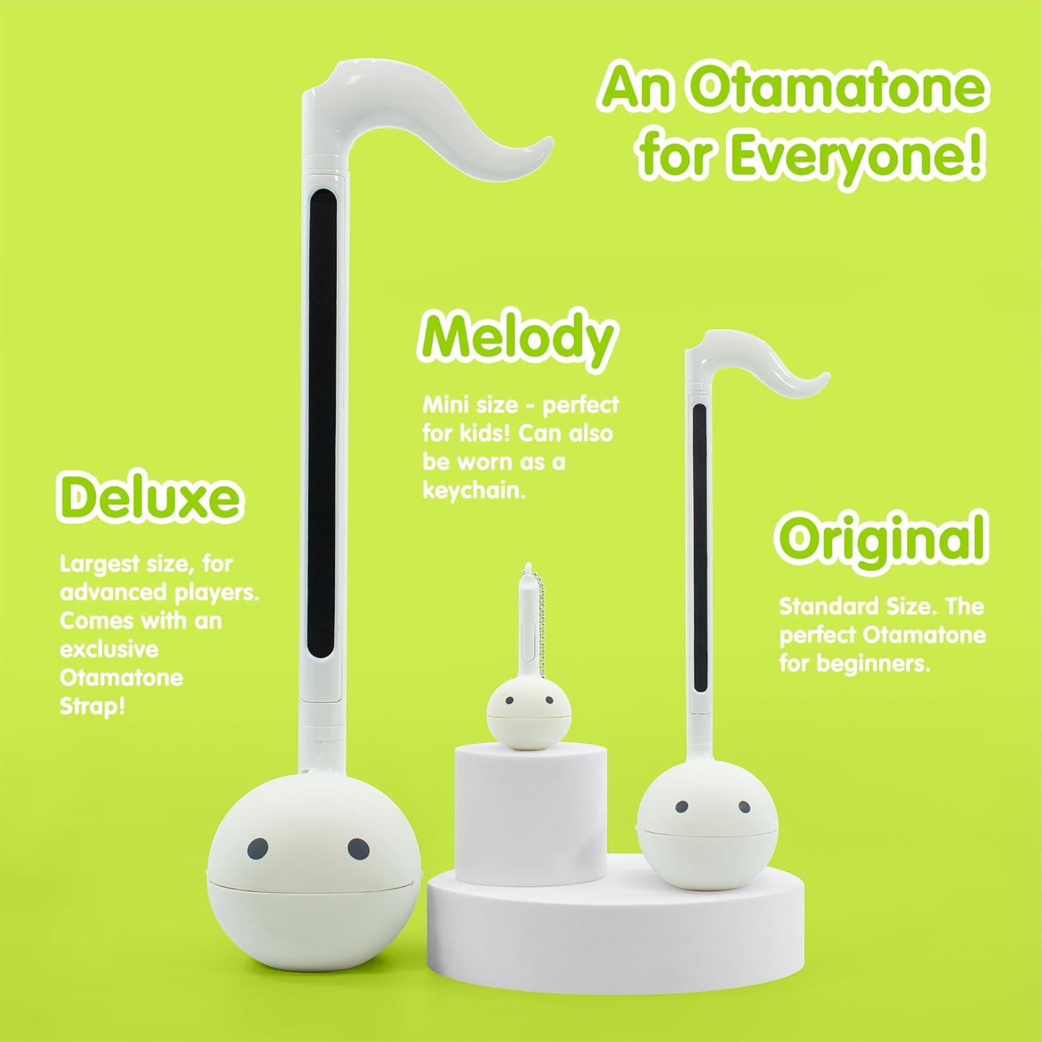 image:imageOtamatone Melody Series Japanese Electronic Mini Size Musical Toy 11 PreProgrammed Songs Portable Synthesizer from Japan by Maywa Denki English Instruction RedLime